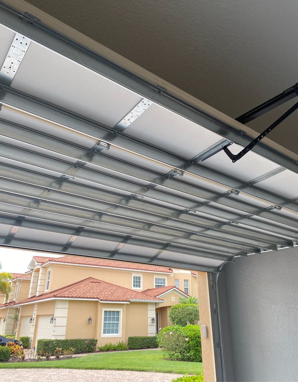 Technician servicing a garage door